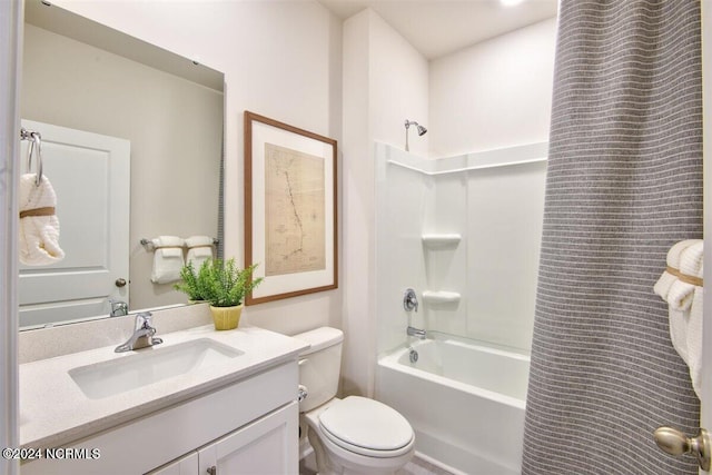 full bathroom with washtub / shower combination, toilet, and vanity