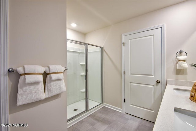 bathroom featuring vanity and walk in shower