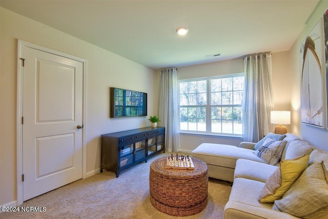 living room with light carpet