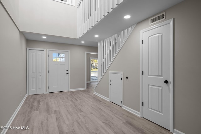 entrance foyer with light wood-type flooring