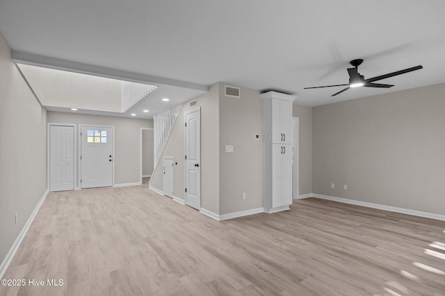 interior space with ceiling fan and light wood-type flooring