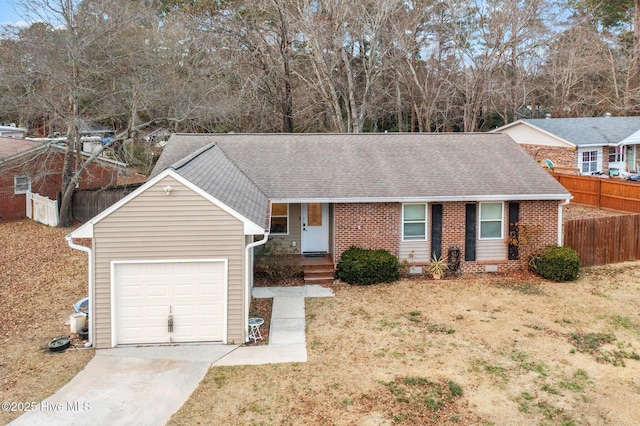 single story home with a garage and a front lawn