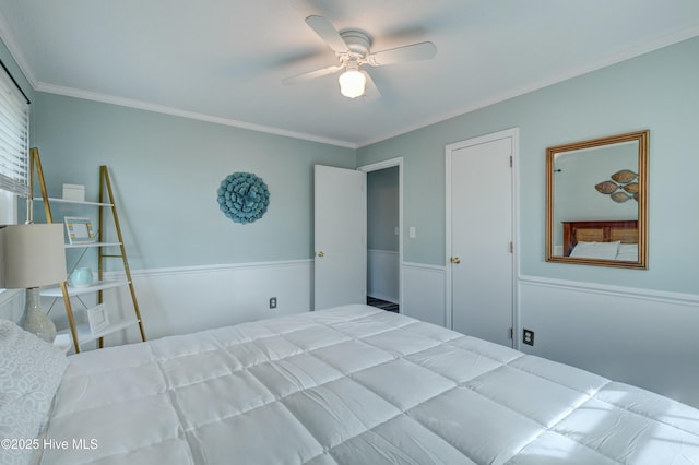 unfurnished bedroom featuring crown molding and ceiling fan