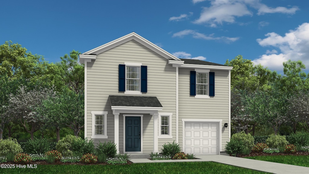 view of front of home featuring an attached garage and driveway