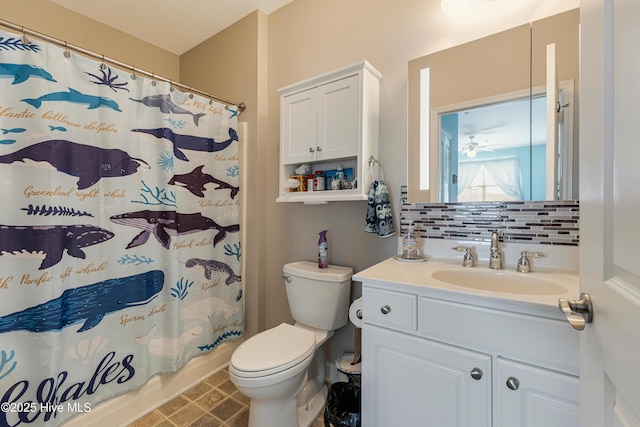 full bathroom with backsplash, toilet, vanity, and shower / bath combo