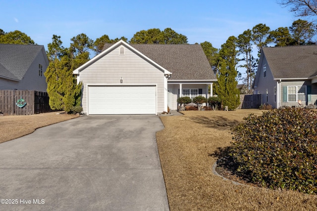 view of front facade with a garage and a front lawn