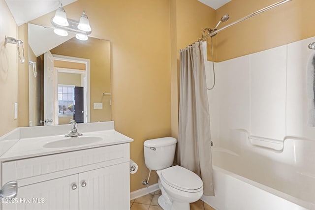 full bathroom with vanity, shower / tub combo with curtain, tile patterned floors, and toilet