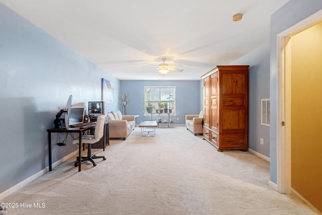 office area featuring light colored carpet and ceiling fan