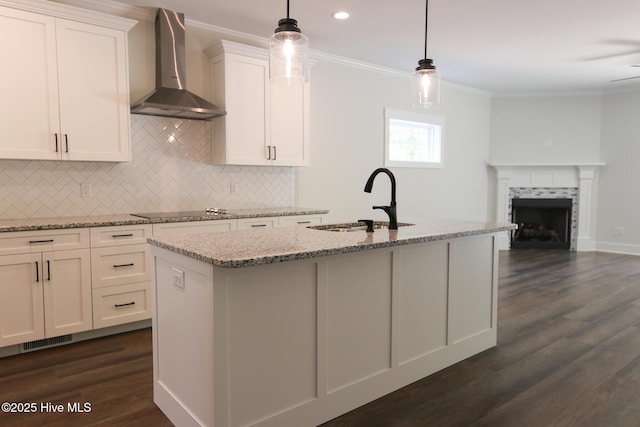 corridor featuring marble finish floor and baseboards
