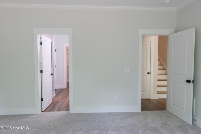 unfurnished bedroom with light carpet, baseboards, a closet, and ceiling fan