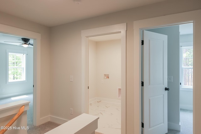 unfurnished bedroom with baseboards, carpet flooring, and a closet