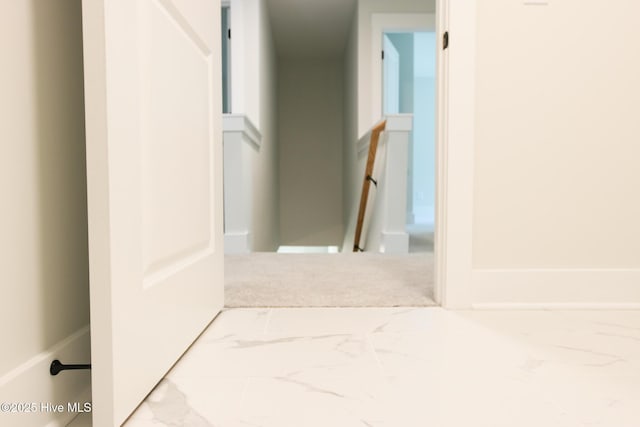 interior space with marble finish floor