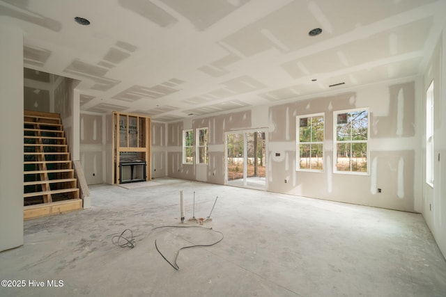 unfurnished living room with plenty of natural light