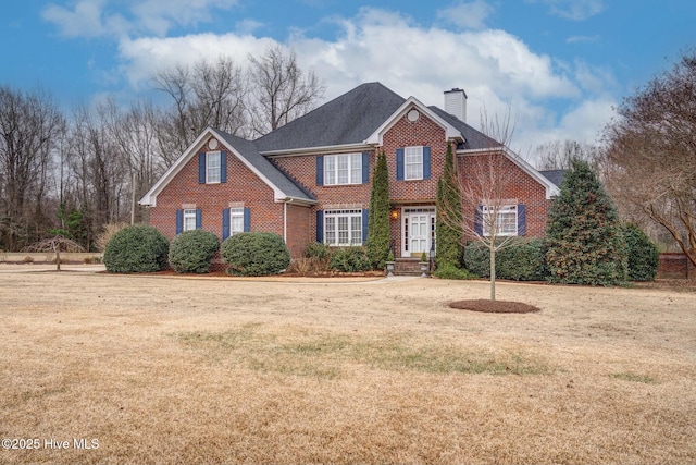 view of property featuring a front yard