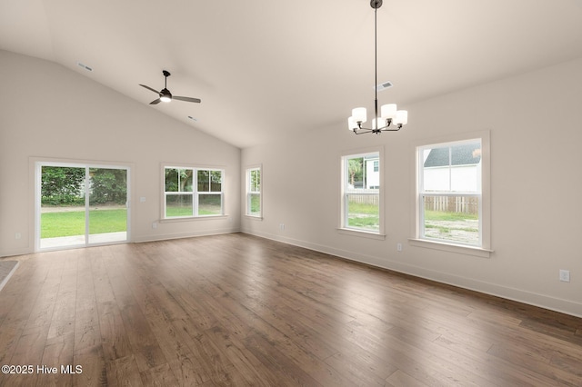 unfurnished living room with lofted ceiling, dark hardwood / wood-style floors, and ceiling fan with notable chandelier