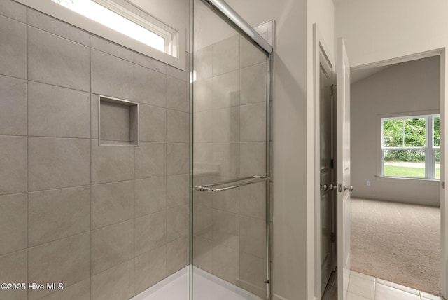 bathroom featuring an enclosed shower