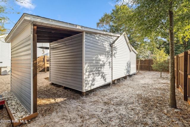 view of outbuilding featuring central air condition unit