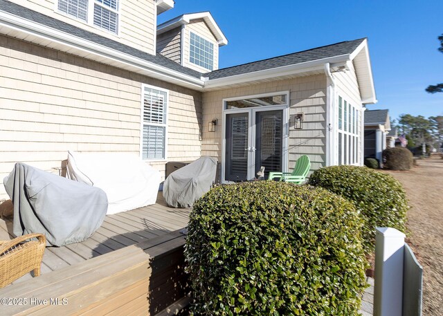 wooden terrace featuring a grill