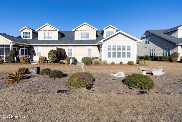 view of front facade featuring a shingled roof