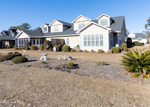 view of front of property with a shingled roof