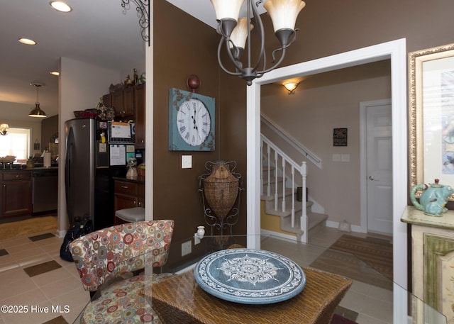 dining area with stairway, a notable chandelier, recessed lighting, and light tile patterned floors