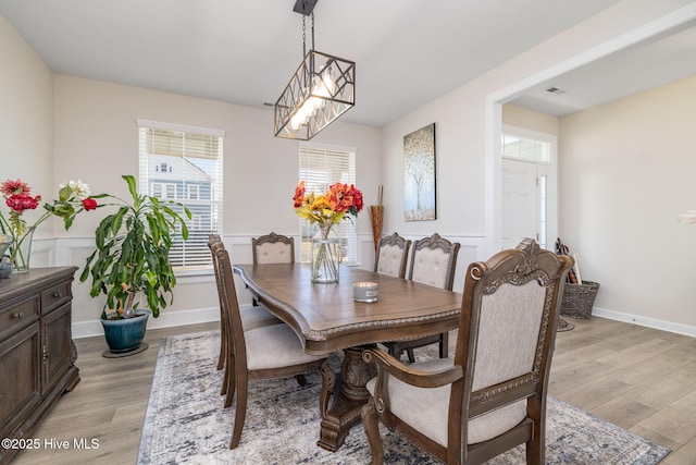 dining room with light hardwood / wood-style floors