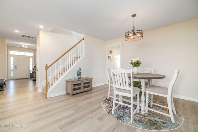 dining room featuring light hardwood / wood-style floors