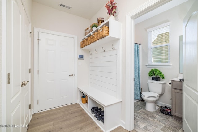 mudroom with light wood-type flooring