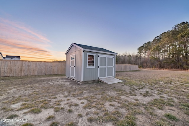 view of outdoor structure at dusk