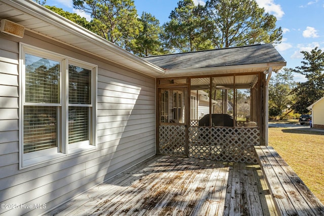 deck featuring a sunroom