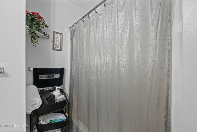 bathroom with a textured ceiling