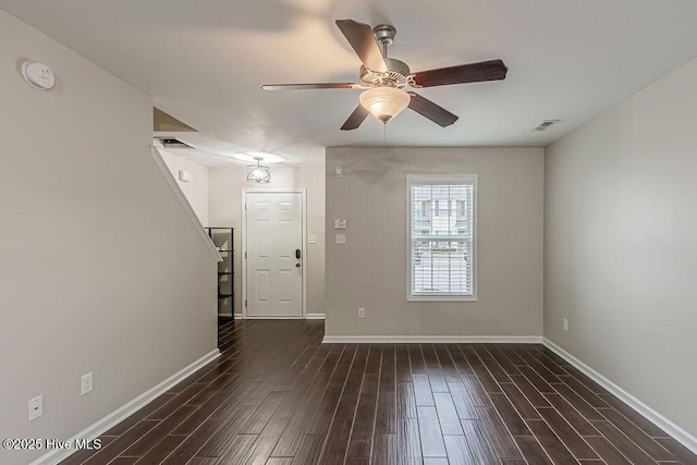 unfurnished room with ceiling fan