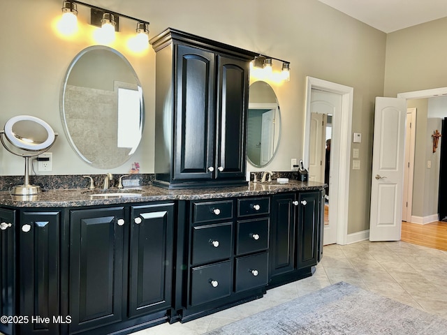 bathroom with vanity and tile patterned floors