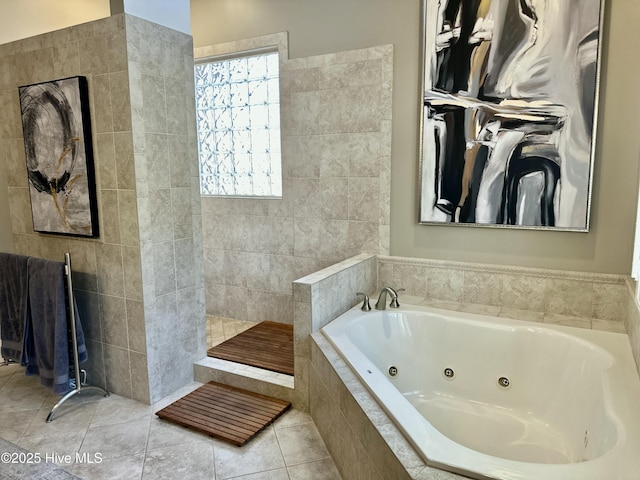 bathroom featuring tile walls, tile patterned flooring, and shower with separate bathtub