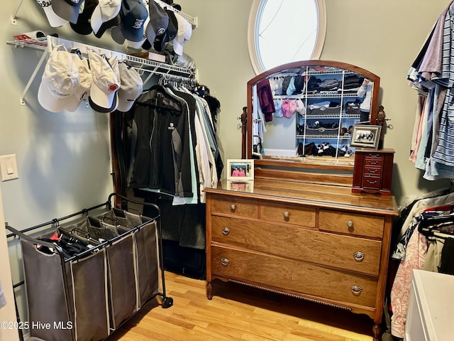 spacious closet featuring light wood-type flooring