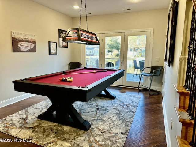 recreation room with dark hardwood / wood-style flooring, pool table, and french doors