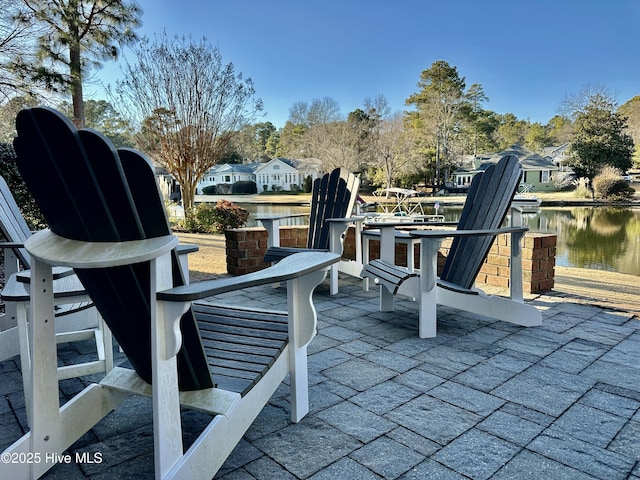 view of patio / terrace featuring a water view