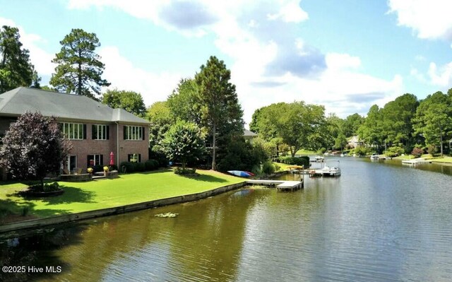 water view featuring a dock