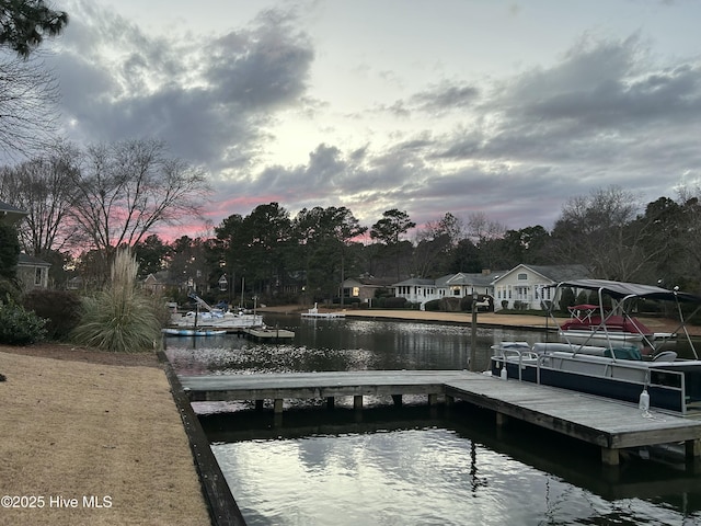 view of dock with a water view