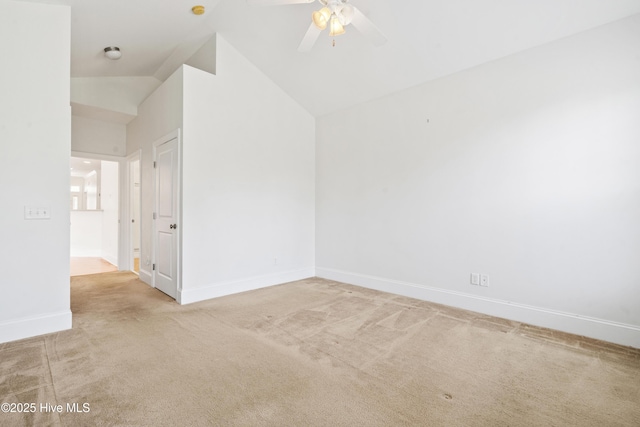 7195 Bonaventure St SW Apt 104, Ocean Isle Beach, NC 28469 - spare room with carpet flooring, baseboards, ceiling fan, and lofted ceiling