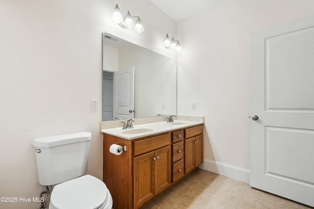 7195 Bonaventure St SW Apt 104, Ocean Isle Beach, NC 28469 - full bath with toilet, tile patterned flooring, and double vanity