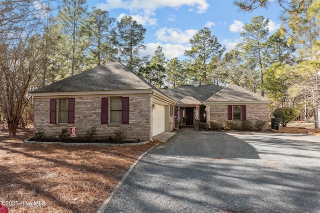 ranch-style home with a garage