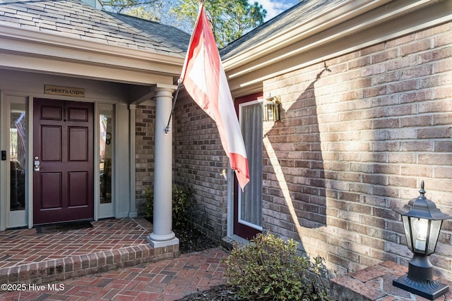 entrance to property with a porch