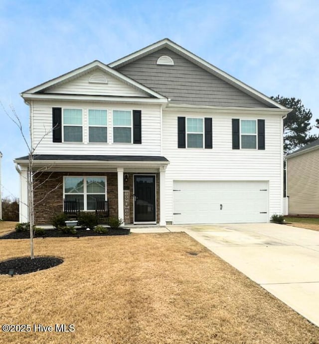 front of property with a garage