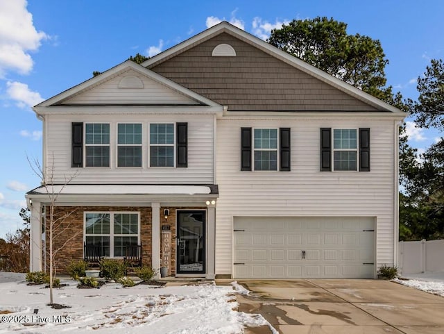 front of property with a garage