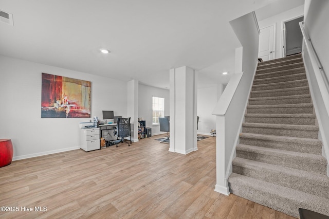 home office featuring visible vents, recessed lighting, baseboards, and wood finished floors