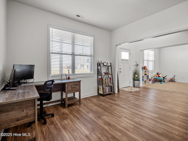 home office featuring hardwood / wood-style flooring