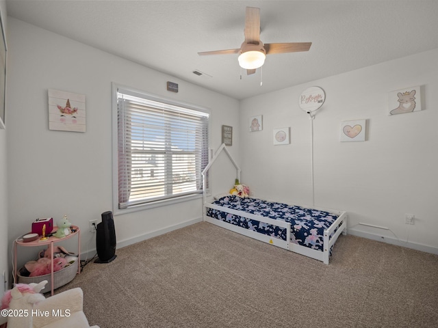 carpeted bedroom featuring ceiling fan