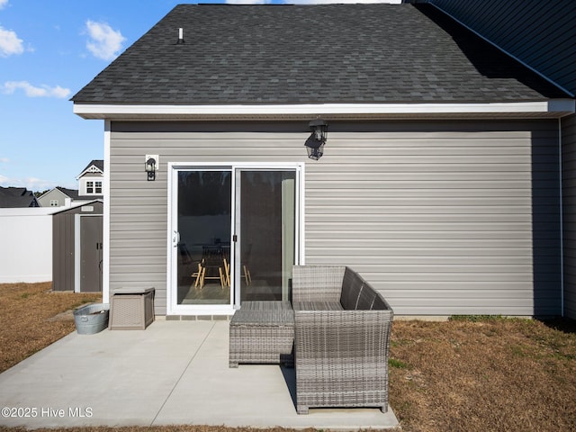 rear view of house featuring a patio