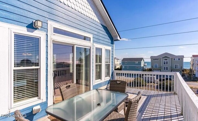 wooden balcony featuring a deck